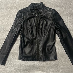 Tahari 100% lamb leather . Like new. No tags.